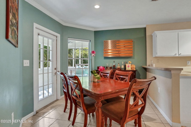 1655 The Greens Way Unit 3416, Jacksonville Beach, FL 32250 - dining area featuring light tile patterned floors, baseboards, ornamental molding, and recessed lighting