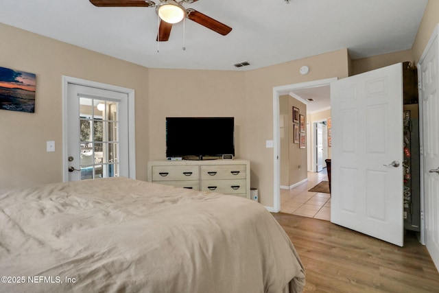 1655 The Greens Way Unit 3416, Jacksonville Beach, FL 32250 - bedroom featuring light wood-style floors and ceiling fan