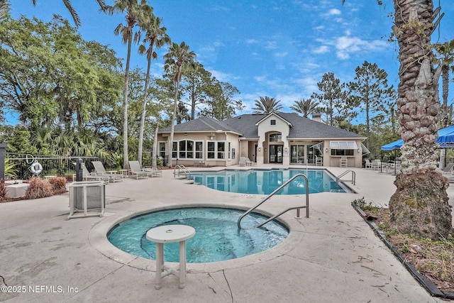 1655 The Greens Way Unit 3416, Jacksonville Beach, FL 32250 - community pool featuring a patio area