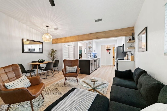 2275 Fairway Villas Ln N, Atlantic Beach, FL 32233 - living room with light wood finished floors