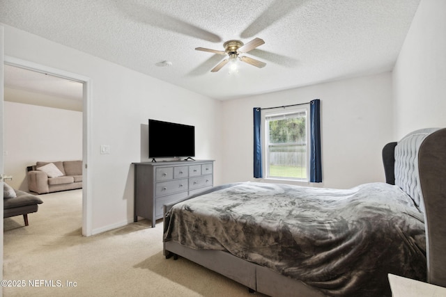 312 Turtle Dove Dr, Orange Park, FL 32073 - bedroom with light carpet, a textured ceiling, and a ceiling fan