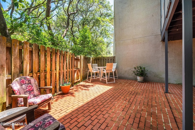2279 Seminole Rd Unit 11, Atlantic Beach, FL 32233 - fenced backyard featuring a patio area