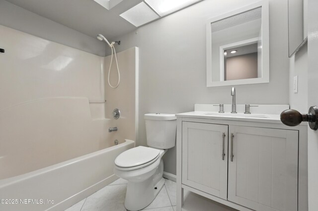 257 Jasmine St, Atlantic Beach, FL 32233 - full bath with toilet,  shower combination, vanity, tile patterned floors, and baseboards