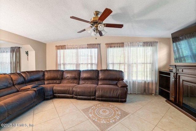 17 Rollins Ave, Saint Augustine, FL 32084 - living room with light tile patterned floors, healthy amount of natural light, a ceiling fan, and a textured ceiling