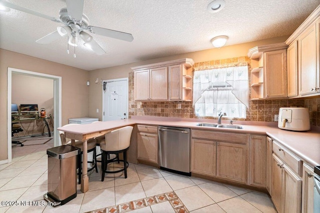 17 Rollins Ave, Saint Augustine, FL 32084 - kitchen featuring stainless steel dishwasher, open shelves, a sink, light tile patterned floors, and backsplash