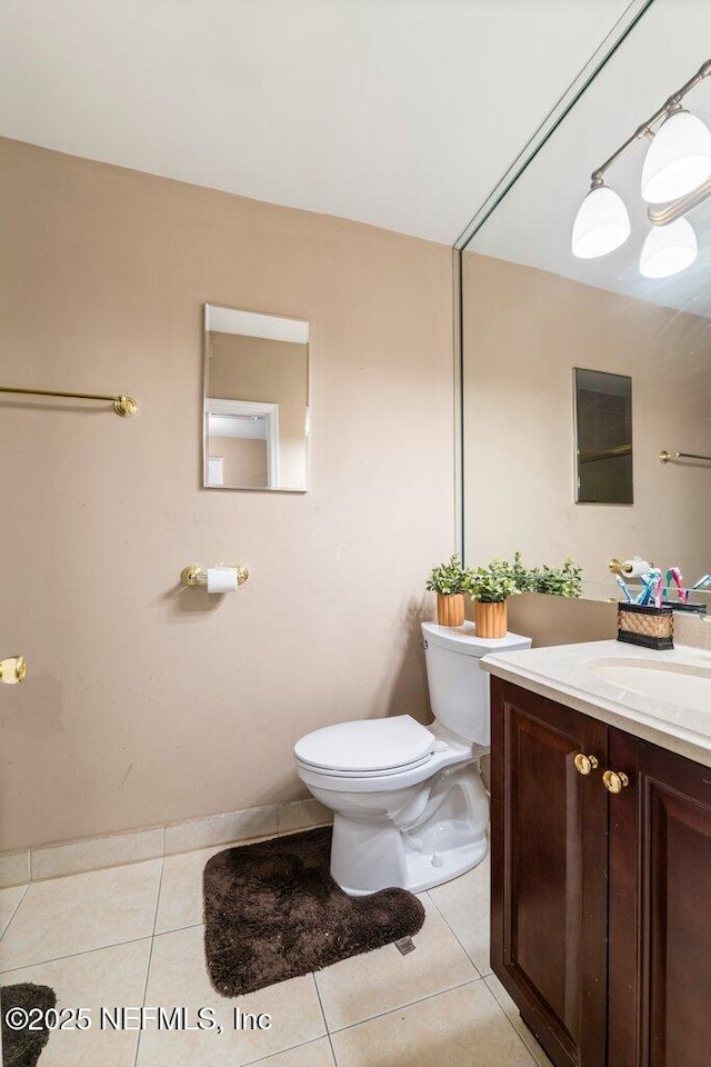 17 Rollins Ave, Saint Augustine, FL 32084 - bathroom with tile patterned floors, toilet, and vanity