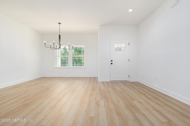 1873 Openwoods Rd, Middleburg, FL 32068 - entrance foyer featuring a chandelier, light wood-style flooring, baseboards, and recessed lighting