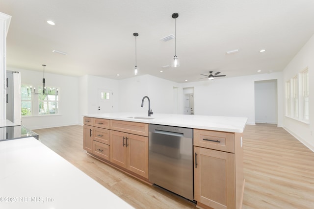 1873 Openwoods Rd, Middleburg, FL 32068 - kitchen with stainless steel dishwasher, a sink, light wood-style flooring, open floor plan, and recessed lighting