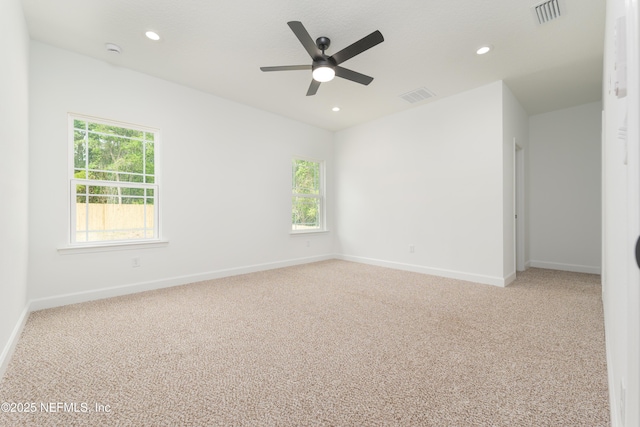 1873 Openwoods Rd, Middleburg, FL 32068 - spare room featuring baseboards, light colored carpet, a ceiling fan, recessed lighting, and a smoke detector