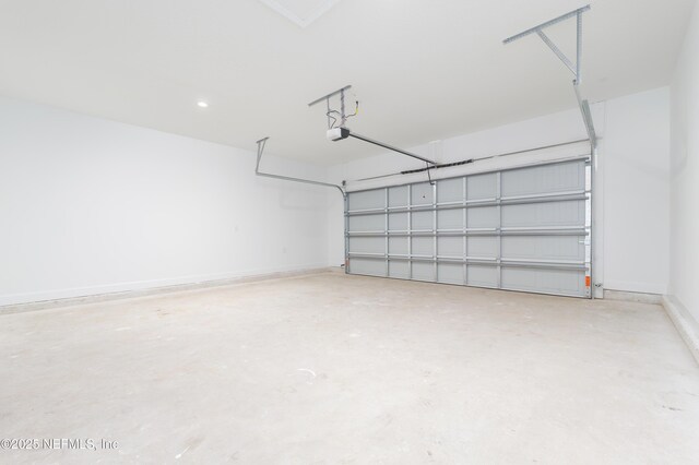 1873 Openwoods Rd, Middleburg, FL 32068 - garage with a garage door opener and baseboards
