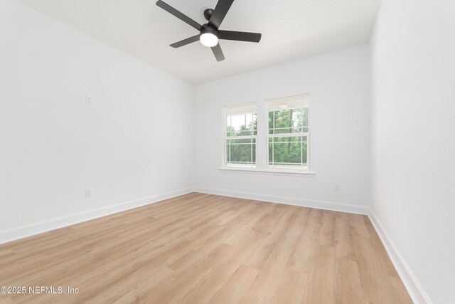 1873 Openwoods Rd, Middleburg, FL 32068 - empty room featuring light wood-style flooring, baseboards, and ceiling fan
