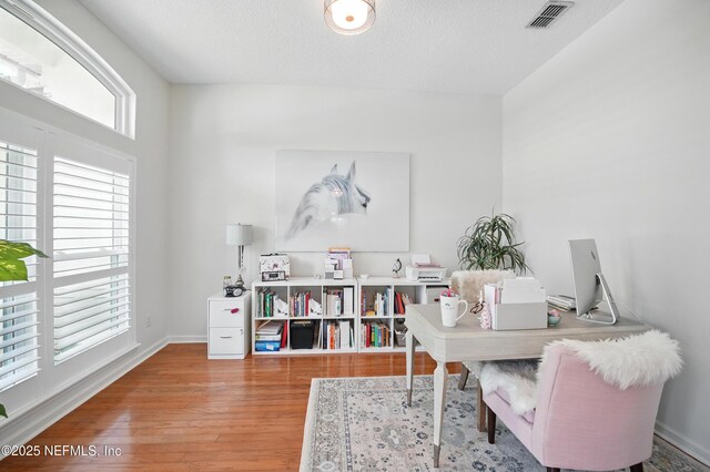 784 Mill Stream Rd, Ponte Vedra Beach, FL 32082 - office area with wood finished floors and baseboards