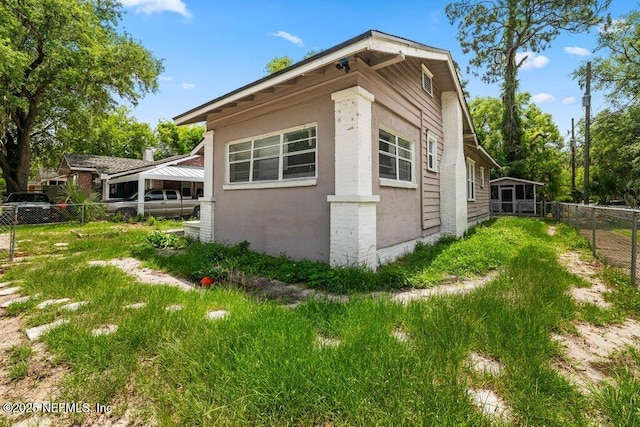 4537 Springfield Blvd, Jacksonville, FL 32206 - view of home's exterior featuring stucco siding