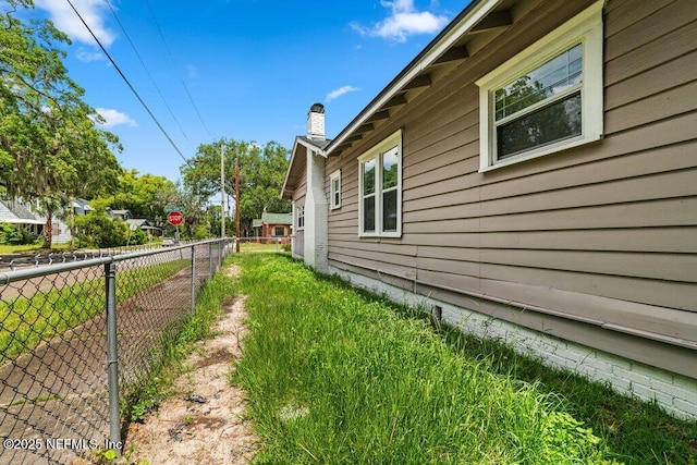 4537 Springfield Blvd, Jacksonville, FL 32206 - view of property exterior with a chimney