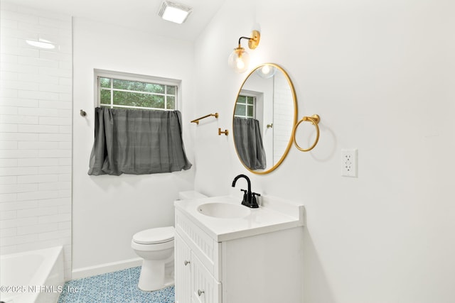1927 Lakewood Cir N, Jacksonville, FL 32207 - bathroom with vanity, toilet, baseboards, and tile patterned flooring