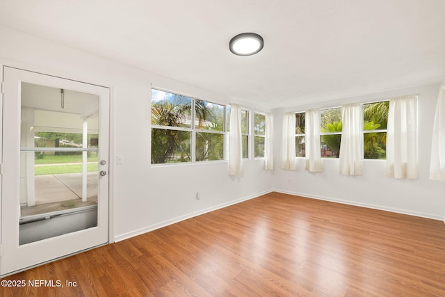 1927 Lakewood Cir N, Jacksonville, FL 32207 - unfurnished sunroom with plenty of natural light
