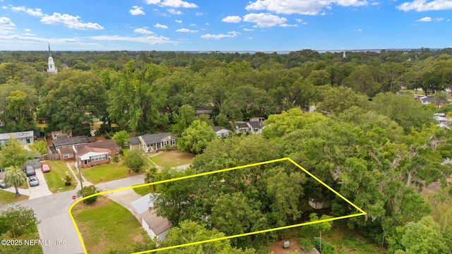 1927 Lakewood Cir N, Jacksonville, FL 32207 - aerial view of residential area with property parcel outlined and a heavily wooded area