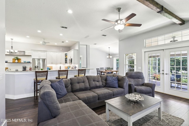 1708 Bridled Tern Ct, Fleming Island, FL 32003 - living room featuring a ceiling fan, dark wood-style floors, healthy amount of natural light, recessed lighting, and a textured ceiling
