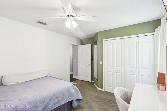1708 Bridled Tern Ct, Fleming Island, FL 32003 - bedroom with carpet flooring, a closet, a ceiling fan, and baseboards