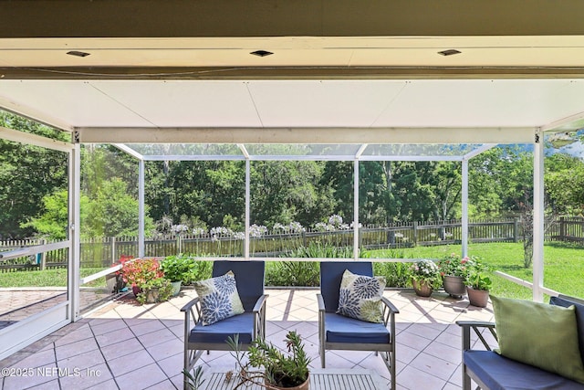 1708 Bridled Tern Ct, Fleming Island, FL 32003 - sunroom / solarium featuring outdoor lounge area, healthy amount of natural light, and view of wooded area