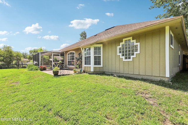 1708 Bridled Tern Ct, Fleming Island, FL 32003 - back of property featuring a patio area and roof with shingles