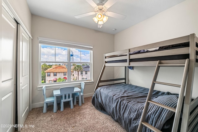 2189 2nd St S, Jacksonville Beach, FL 32250 - bedroom featuring carpet flooring, baseboards, a closet, and a ceiling fan