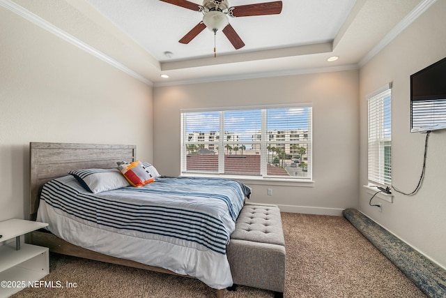 2189 2nd St S, Jacksonville Beach, FL 32250 - bedroom with a tray ceiling, multiple windows, carpet flooring, recessed lighting, and crown molding
