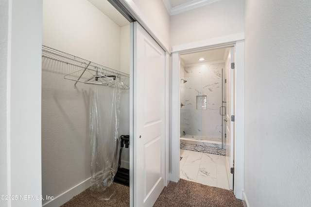 2189 2nd St S, Jacksonville Beach, FL 32250 - full bathroom featuring a marble finish shower, marble look tiles, a walk in closet, crown molding, and recessed lighting
