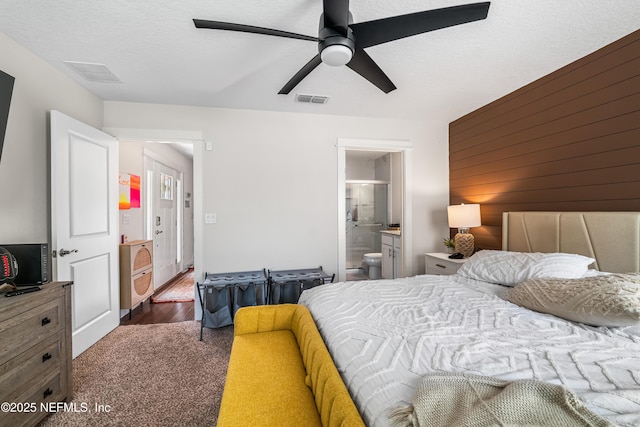 2189 2nd St S, Jacksonville Beach, FL 32250 - bedroom featuring carpet floors, connected bathroom, and ceiling fan