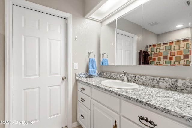133 Divi Divi Dr, San Mateo, FL 32187 - bathroom with vanity and curtained shower