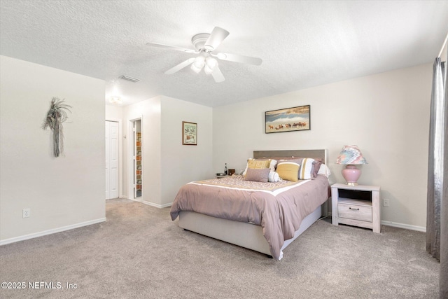 133 Divi Divi Dr, San Mateo, FL 32187 - bedroom with carpet flooring, a textured ceiling, baseboards, and a ceiling fan