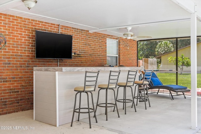 133 Divi Divi Dr, San Mateo, FL 32187 - view of patio / terrace featuring exterior bar and ceiling fan