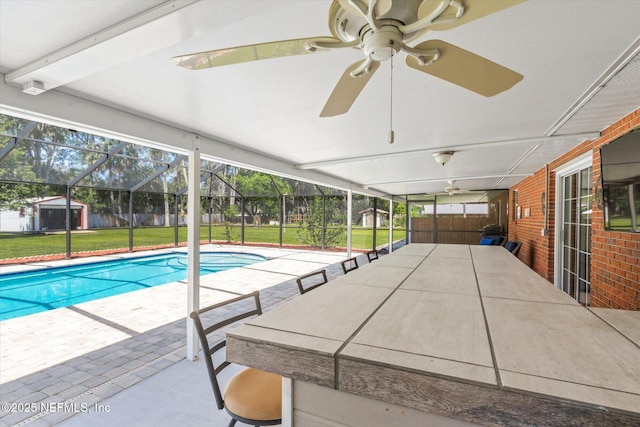 133 Divi Divi Dr, San Mateo, FL 32187 - swimming pool with a patio, a yard, a lanai, and a ceiling fan