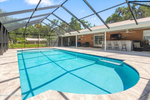 133 Divi Divi Dr, San Mateo, FL 32187 - swimming pool featuring a ceiling fan, a patio, and a lanai