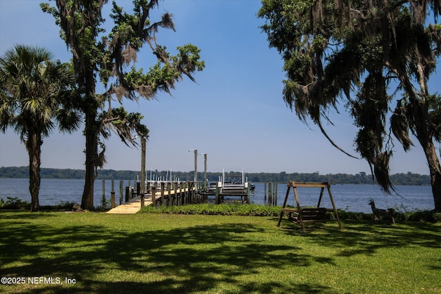 133 Divi Divi Dr, San Mateo, FL 32187 - dock area with a water view, a yard, and boat lift