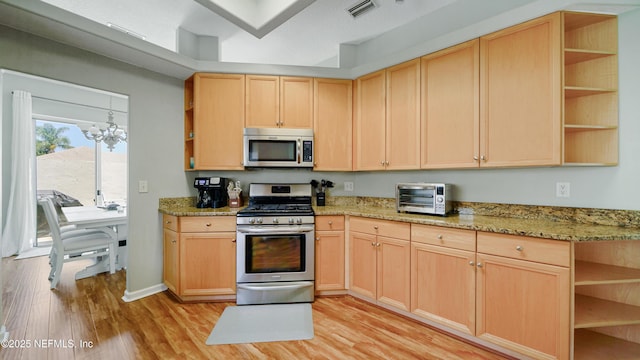 165 Cedar Ridge Cir, Saint Augustine, FL 32080 - kitchen featuring open shelves, stainless steel appliances, light brown cabinets, and light wood-style flooring