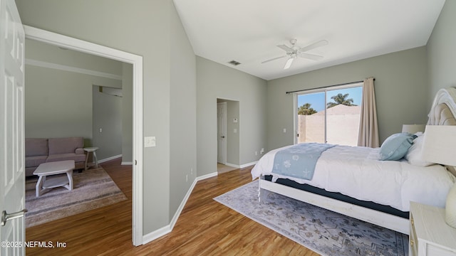 165 Cedar Ridge Cir, Saint Augustine, FL 32080 - bedroom featuring wood finished floors, baseboards, access to exterior, and ceiling fan