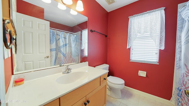 165 Cedar Ridge Cir, Saint Augustine, FL 32080 - bathroom with toilet, vanity, a shower with shower curtain, baseboards, and tile patterned floors