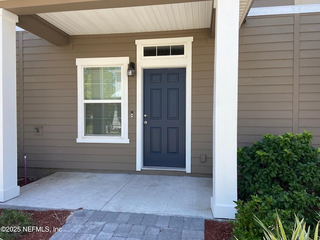 86768 Shortline Cir, Yulee, FL 32097 - property entrance featuring a porch