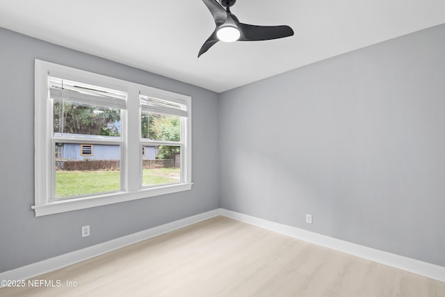 1470 River Hills Cir E, Jacksonville, FL 32211 - spare room featuring light wood finished floors, a ceiling fan, and baseboards