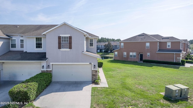6033 Bartram Village Dr, Jacksonville, FL 32258 - traditional-style house with an attached garage, concrete driveway, stone siding, a front yard, and stucco siding
