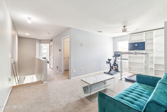 6033 Bartram Village Dr, Jacksonville, FL 32258 - carpeted living room with plenty of natural light, a textured ceiling, baseboards, and ceiling fan