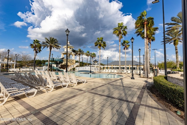 6033 Bartram Village Dr, Jacksonville, FL 32258 - community pool with a water slide and a patio area