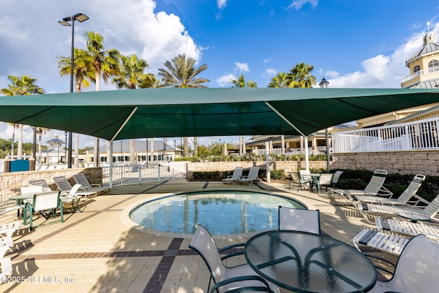 6033 Bartram Village Dr, Jacksonville, FL 32258 - outdoor pool with a patio area and outdoor dining area