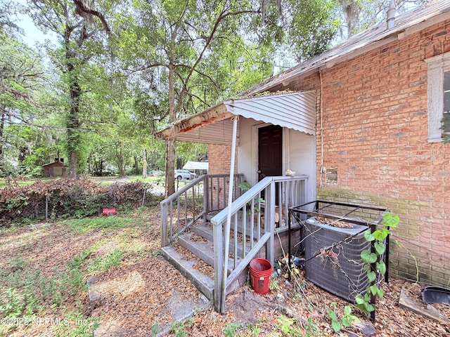 2771 Sunnyside St, Jacksonville, FL 32254 - property entrance with brick siding and cooling unit