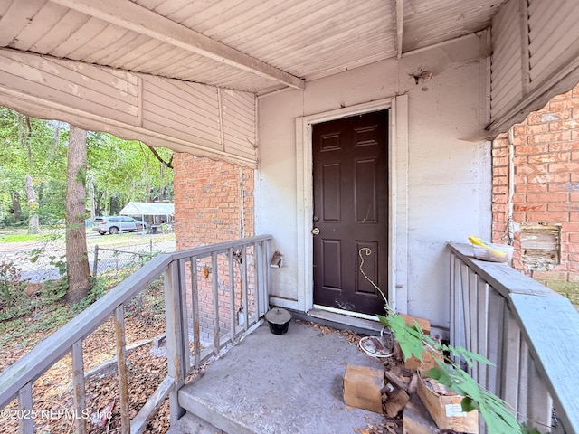 2771 Sunnyside St, Jacksonville, FL 32254 - doorway to property featuring brick siding