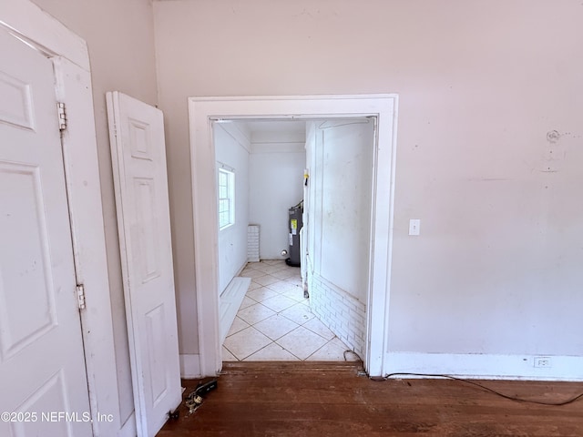 2771 Sunnyside St, Jacksonville, FL 32254 - hallway featuring water heater and light wood-style floors