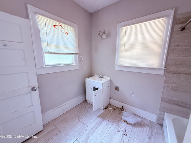 2771 Sunnyside St, Jacksonville, FL 32254 - full bathroom with a bathtub, vanity, a shower, and baseboards