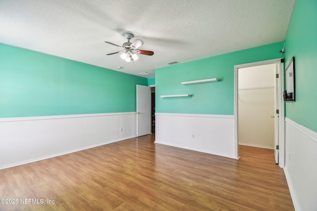 116 Nunna Rock Trl, Saint Augustine, FL 32092 - spare room with wood finished floors, a textured ceiling, and ceiling fan