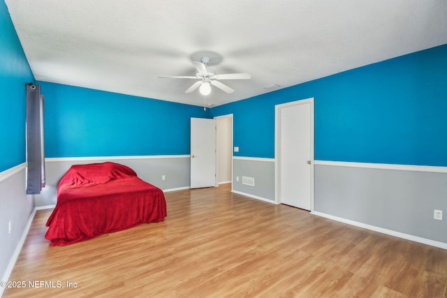 116 Nunna Rock Trl, Saint Augustine, FL 32092 - bedroom featuring wood finished floors, baseboards, and a ceiling fan